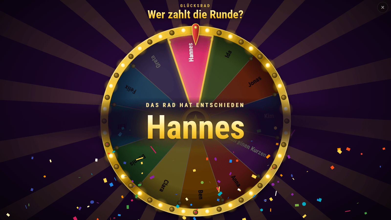 Glücksrad nach dem Dreh: Spotlight auf das Feld „Hannes“, darüber „Das Rad hat entschieden“ und der Name groß, ringsum Konfetti