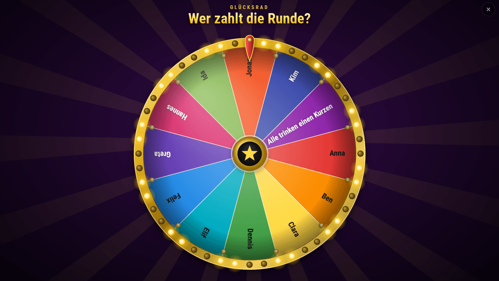 Glücksrad „Wer zahlt die Runde?“ auf der TV-Anzeige: zwölf bunte Felder mit Vornamen und „Alle trinken einen Kurzen“, goldener Rand mit Lauflicht und roter Zeiger